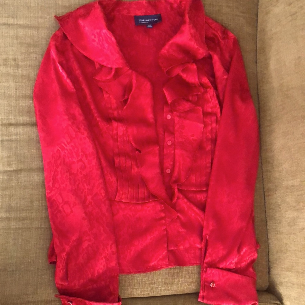 Wear this silk pleated blouse to any occasion. SizeL color red